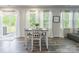 Bright dining area filled with natural light, perfect for Gathering meals and gatherings at 115 Haddonsfield Dr, Mooresville, NC 28115