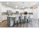 Kitchen with quartz countertops, stainless steel appliances, and a large center island at 115 Haddonsfield Dr, Mooresville, NC 28115