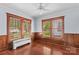 Charming bedroom with hardwood floors, wood trim, and lots of natural light at 119 Wiley Ave, Salisbury, NC 28144