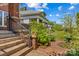 Charming front yard featuring a brick path, mature landscaping, and a well-maintained lawn at 119 Wiley Ave, Salisbury, NC 28144