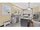 Updated kitchen with stainless steel appliances, granite counters and center island at 119 Wiley Ave, Salisbury, NC 28144