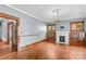 Elegant living room featuring hardwood floors, fireplace, and classic architectural details, creating a warm ambiance at 119 Wiley Ave, Salisbury, NC 28144