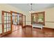 Open living room with hardwood floors, large windows and view of kitchen at 119 Wiley Ave, Salisbury, NC 28144