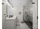 Contemporary bathroom features double vanity, frameless glass shower, and sleek black fixtures at 1628 Starbrook Dr, Charlotte, NC 28210