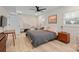 Comfortable bedroom featuring wood floor, neutral tones, and natural light at 1628 Starbrook Dr, Charlotte, NC 28210