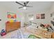 Bright bedroom featuring a small bed, wooden dresser, and decor, creating a playful and inviting space at 1628 Starbrook Dr, Charlotte, NC 28210