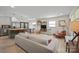 Bright and open floor plan featuring a modern living room, kitchen, and dining area with hardwood floors at 1628 Starbrook Dr, Charlotte, NC 28210