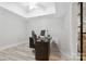 Bright home office with a modern desk, chair, and ample natural light at 18730 Floyd Ct, Davidson, NC 28036