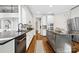 Modern kitchen featuring sleek countertops, stainless steel appliances, and ample cabinet space at 18730 Floyd Ct, Davidson, NC 28036