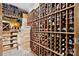 Walk-in wine cellar with wooden racks storing an extensive collection of wines at 18730 Floyd Ct, Davidson, NC 28036