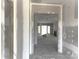 Spacious living room featuring an open floor plan, and sliding doors to the backyard at 19028 Newburg Hill Rd, Davidson, NC 28036