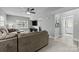 Inviting living room featuring a comfortable sofa and a ceiling fan at 2100 Shadyview Dr, Charlotte, NC 28210