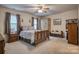 Cozy bedroom with natural light and a decorative ceiling fan at 2478 23Rd Ne St, Hickory, NC 28601