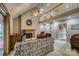 Spacious living room with a fireplace, vaulted ceilings, and a decorative ceiling fan at 2478 23Rd Ne St, Hickory, NC 28601