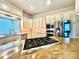 Well-lit kitchen showcasing stainless steel appliances, gas cooktop, and granite countertops at 255 Charlotte Ann Ln, Hickory, NC 28601