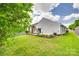 Spacious backyard featuring a well-maintained lawn and landscaped area at 2810 Berry Creek Rd, Charlotte, NC 28214