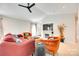 Open-concept living room with neutral walls, a fireplace, and comfortable seating arrangement at 2810 Berry Creek Rd, Charlotte, NC 28214