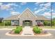 Charming clubhouse with stone accents, providing a welcoming entrance to community amenities and gatherings at 3925 Tokay Ln, Fort Mill, SC 29707