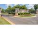 Secure gated entrance with stone pillars and wrought iron gates, ensuring privacy and exclusivity for residents at 3925 Tokay Ln, Fort Mill, SC 29707