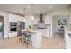 Modern kitchen featuring stainless steel appliances, white cabinets, and a functional island at 3925 Tokay Ln, Fort Mill, SC 29707