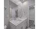 Bathroom with double sinks, modern fixtures, a large mirror, and tile flooring at 4142 Longmore Ln, Kannapolis, NC 28081