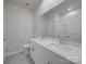 Bathroom featuring double sinks, quartz countertops, and a large mirror at 4142 Longmore Ln, Kannapolis, NC 28081