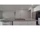 Spacious kitchen features a large center island, stainless steel appliances, and ample counter space at 4142 Longmore Ln, Kannapolis, NC 28081