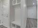 Welcoming mudroom with a built-in bench, storage cubbies, and coat hooks, providing organization at 4142 Longmore Ln, Kannapolis, NC 28081