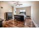 Bedroom with dark wood furniture, hardwood flooring, and a window at 4600 Spicewood Dr, Charlotte, NC 28227