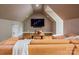 Cozy bonus room with built-in media center and ample seating at 4600 Spicewood Dr, Charlotte, NC 28227