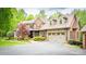 Inviting brick facade, a well-manicured lawn, and a spacious two-car garage create a welcoming curb appeal at 4600 Spicewood Dr, Charlotte, NC 28227