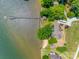 Aerial view of a home with a private beach and dock on a lake at 5200 Masons Ferry Rd, Clover, SC 29710