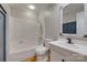 Bathroom featuring a shower/tub combo, vanity with a sink, and unique mirror at 5200 Masons Ferry Rd, Clover, SC 29710