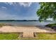 Private beach access that offers a sandy shoreline and tranquil water views at 5200 Masons Ferry Rd, Clover, SC 29710