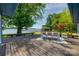 Spacious deck with seating that overlooks lake, great for outdoor dining and relaxation at 5200 Masons Ferry Rd, Clover, SC 29710