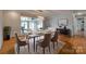 Beautiful dining room with hardwood floors, stylish decor, and plenty of seating at 5200 Masons Ferry Rd, Clover, SC 29710
