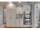 Bright kitchen with white cabinets and stainless steel appliances at 5200 Masons Ferry Rd, Clover, SC 29710