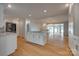Open kitchen view features white cabinets, granite countertops, and stainless steel appliances at 5200 Masons Ferry Rd, Clover, SC 29710