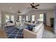 Inviting living room with vaulted ceiling, ceiling fans, and hardwood floors at 5200 Masons Ferry Rd, Clover, SC 29710