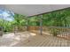 Spacious wooden deck overlooking a lush backyard and mature trees at 634 7Th Avenue Se Pl, Hickory, NC 28602