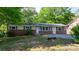 Charming one-story home with brick accents, blue shutters, and a well-maintained front yard at 634 7Th Avenue Se Pl, Hickory, NC 28602