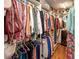 Spacious walk-in closet with custom shelving and plenty of room for storage and organization at 6425 High Creek Ct, Charlotte, NC 28277