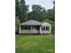 Ranch style home with a covered front porch and visible fire damage at 721 S Spruce St, Rock Hill, SC 29730