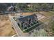 View of new townhomes with sleek exteriors and individual walkouts, set in a developing neighborhood at 722 Falling Oak Aly # 20, Huntersville, NC 28078