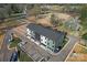 Aerial view of the newly built townhomes with parking, green spaces, and proximity to neighborhood amenities at 722 Falling Oak Aly # 20, Huntersville, NC 28078