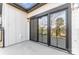 Spacious balcony with sliding glass doors and neighborhood view at 722 Falling Oak Aly # 20, Huntersville, NC 28078