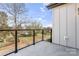 Exterior view from the balcony with sleek black railing and neighborhood view at 722 Falling Oak Aly # 20, Huntersville, NC 28078