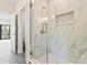 Bathroom featuring a glass enclosed shower, built-in shelving, and modern finishes at 722 Falling Oak Aly # 20, Huntersville, NC 28078