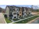 New townhomes offer stylish exteriors, private balconies, and modern design at 722 Falling Oak Aly # 20, Huntersville, NC 28078