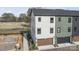 Newly constructed townhome with garage and modern architecture with construction underway at 722 Falling Oak Aly # 20, Huntersville, NC 28078